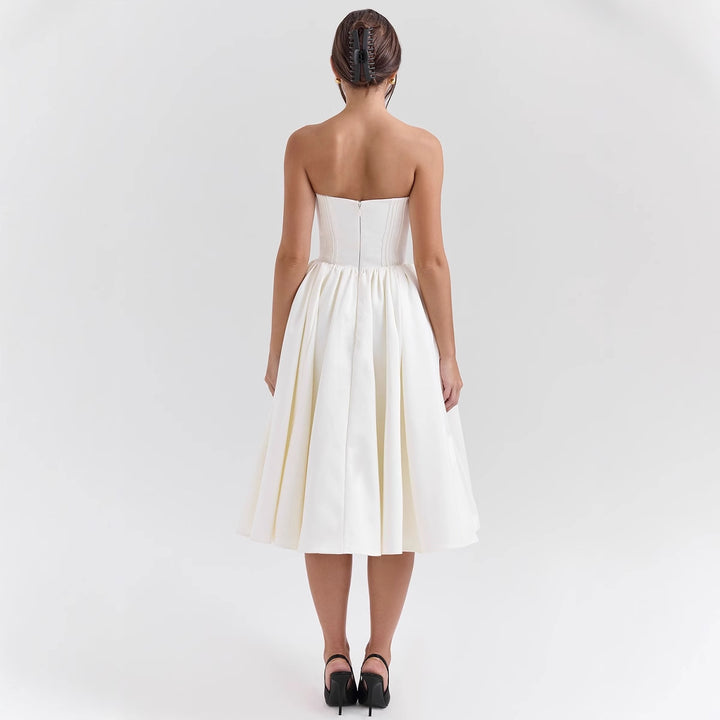 Ladies' couture dress in an off-the-shoulder strap design with a voluminous skirt Lune London