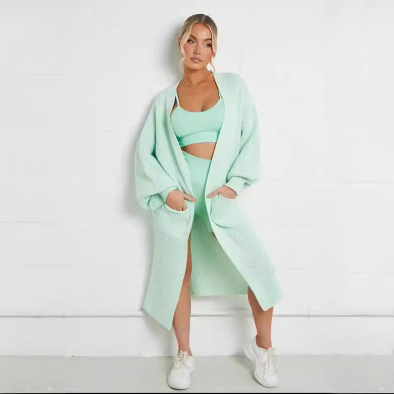 Ladies long cardigan with a chunky knit structure and practical pockets Lune London