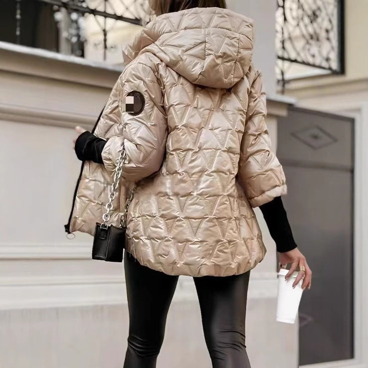 Quilted jacket for women with high collar and practical pockets Lune London
