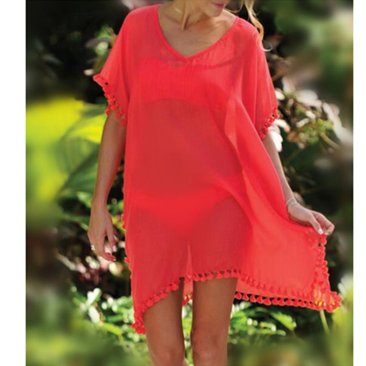 Tuniques de plage pour femmes avec une structure aérienne et des pompons ludiques Chic & Stil