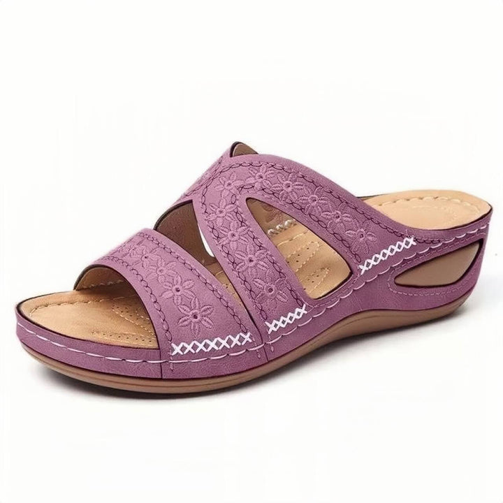 Comfortable strap sandals for women with floral design and adjacent openings Lune London