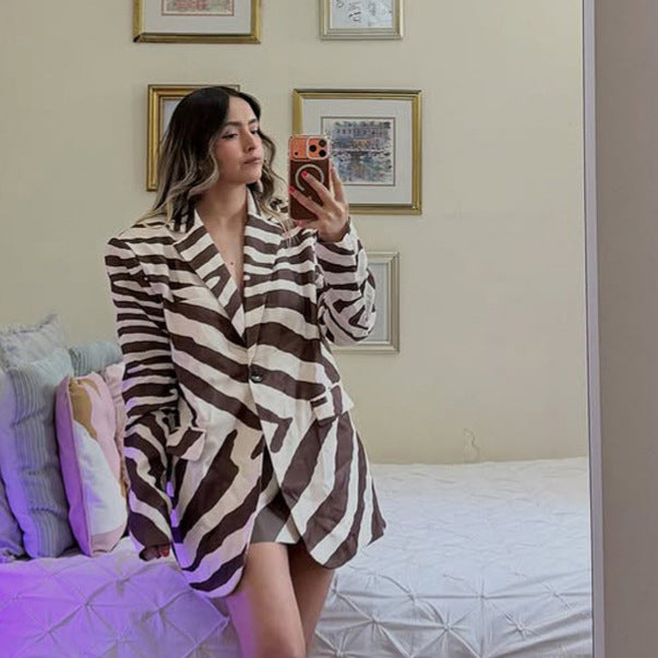 Women’s blazer dress in zebra print with prominent shoulder area & wide waist belt Amarae
