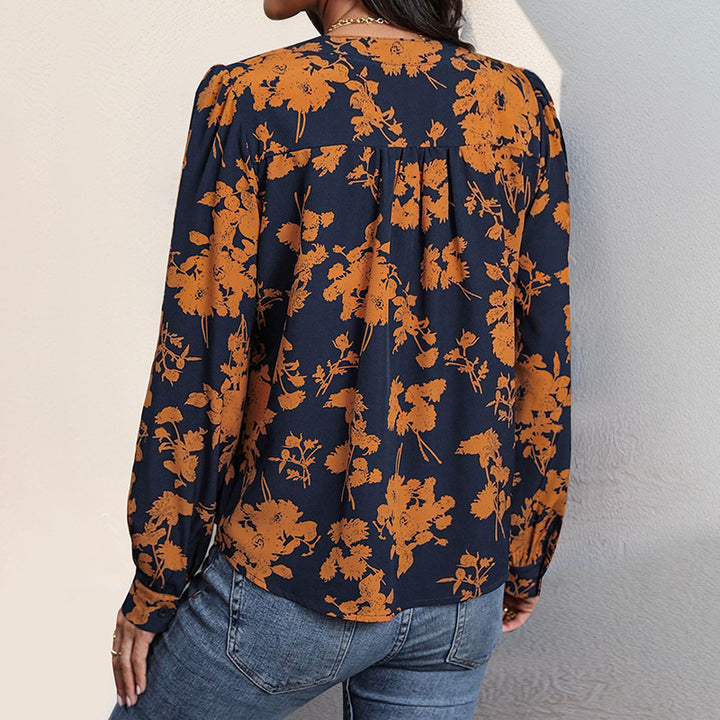 Floral blouse for women with V-neck and puffed sleeves Lune London