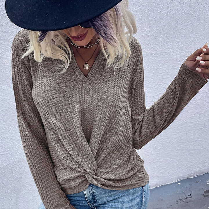 Women's casual long sleeve t-shirt with button details and textured design Lune London