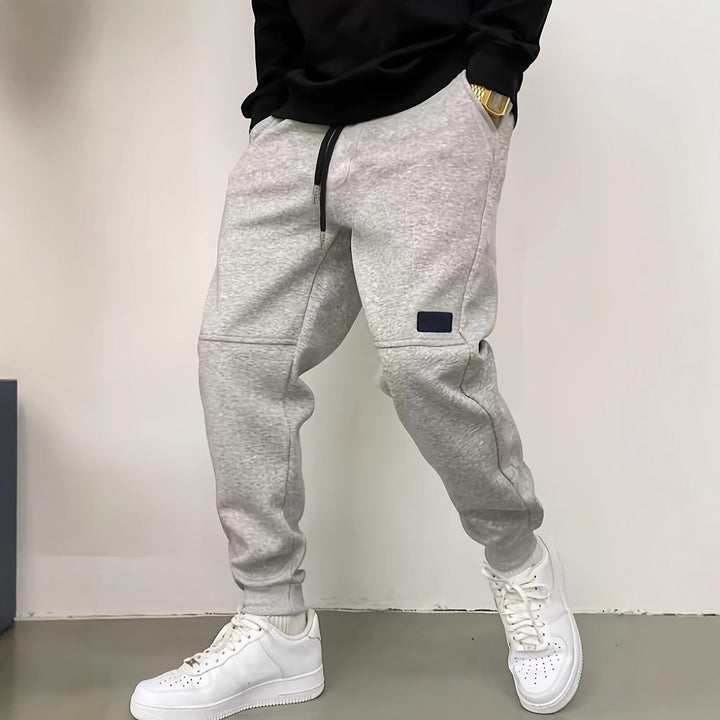 Sporty jogger pants for men with side zipper details Lune London