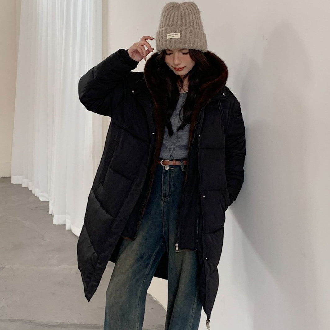 Ladies elegant winter padded parka with faux fur collar and practical pockets Lune London