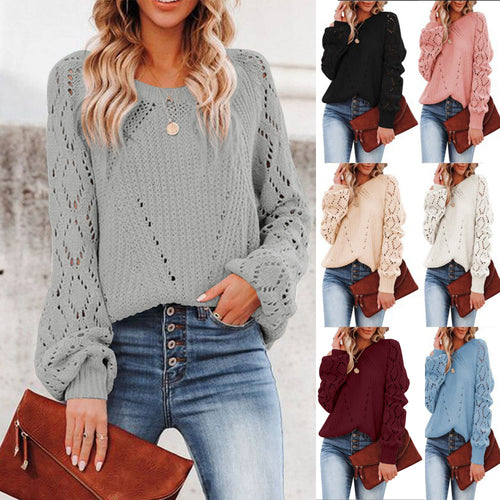 Women chunky knit sweater with V-neck and openings for airy sleeves Amarae
