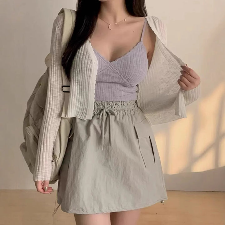 Womens playful cardigan with decorative details and a lightweight fabric Lune London