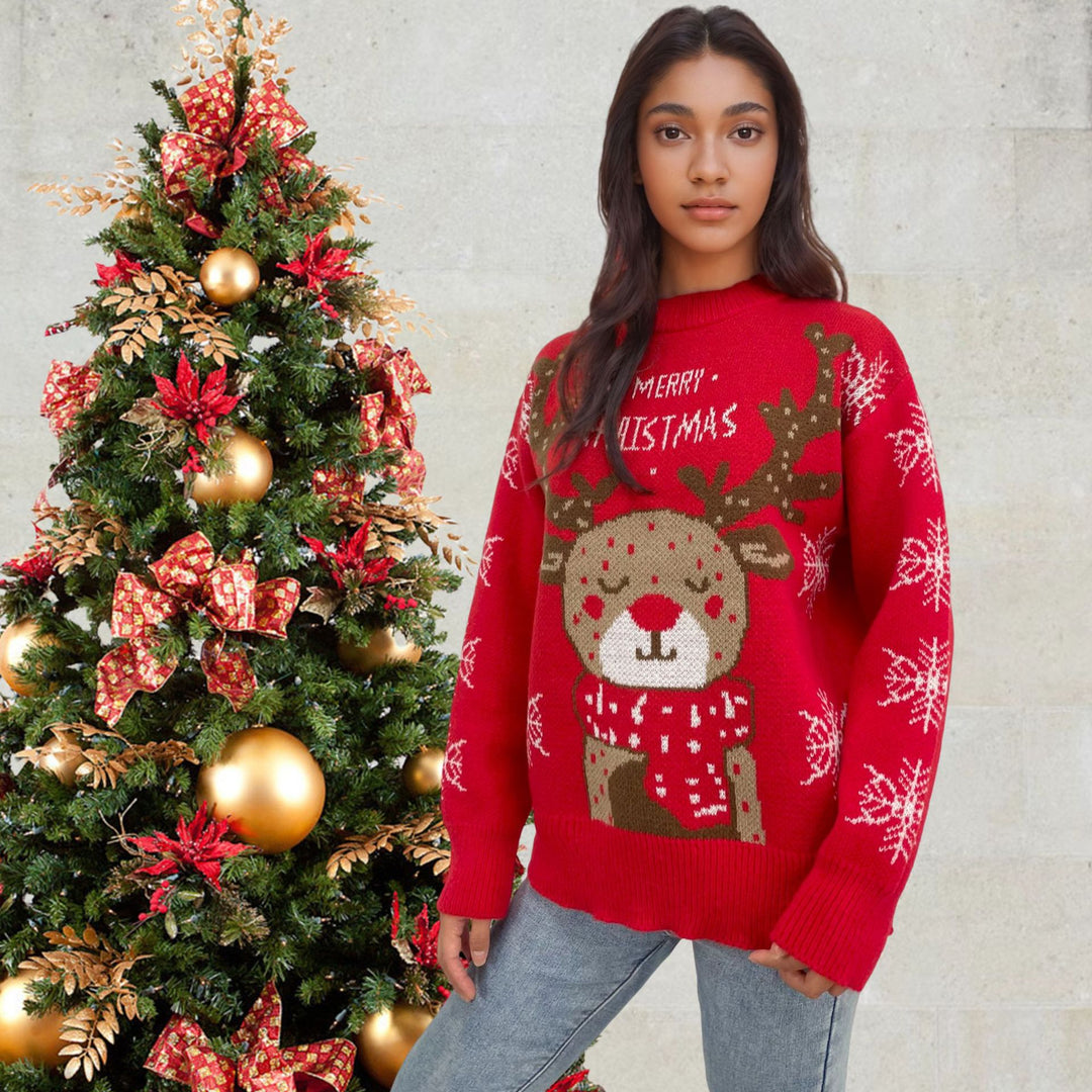 Christmas sweater for women with a cute reindeer pattern and winter snowflakes Lune London