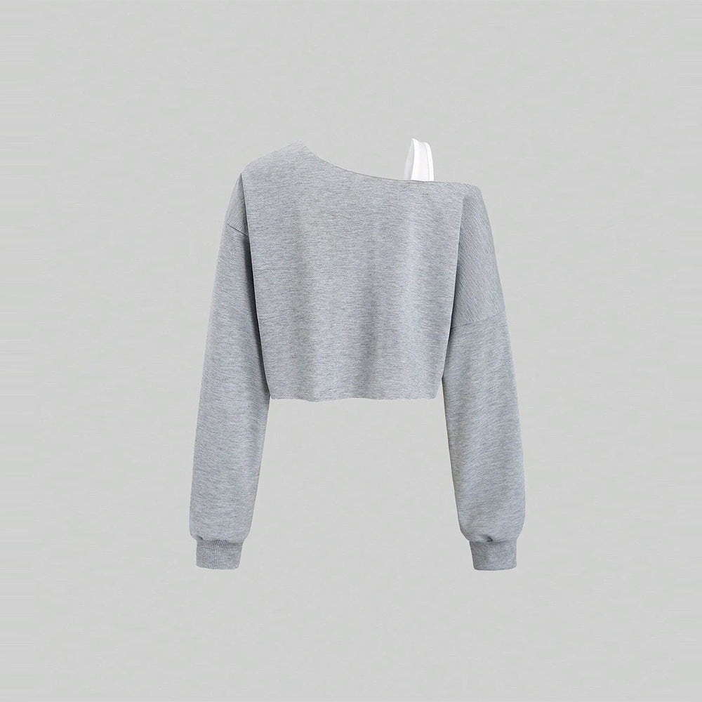 Sweat-shirt court pour femmes avec design asymétrique et manches volumineuses Chic & Stil