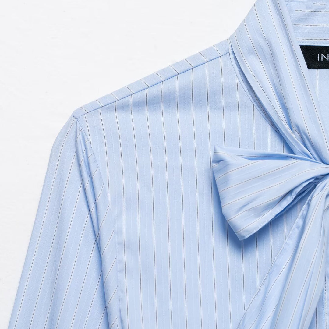 Ladies blouse with bow collar and tailored inset seams Amarae