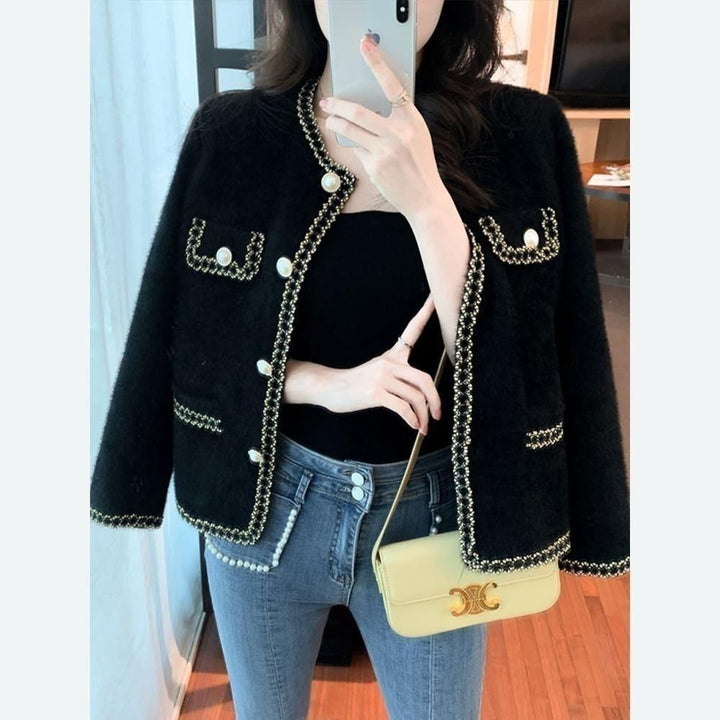 Veste bouclée élégante pour femmes avec garniture en perles Chic & Stil