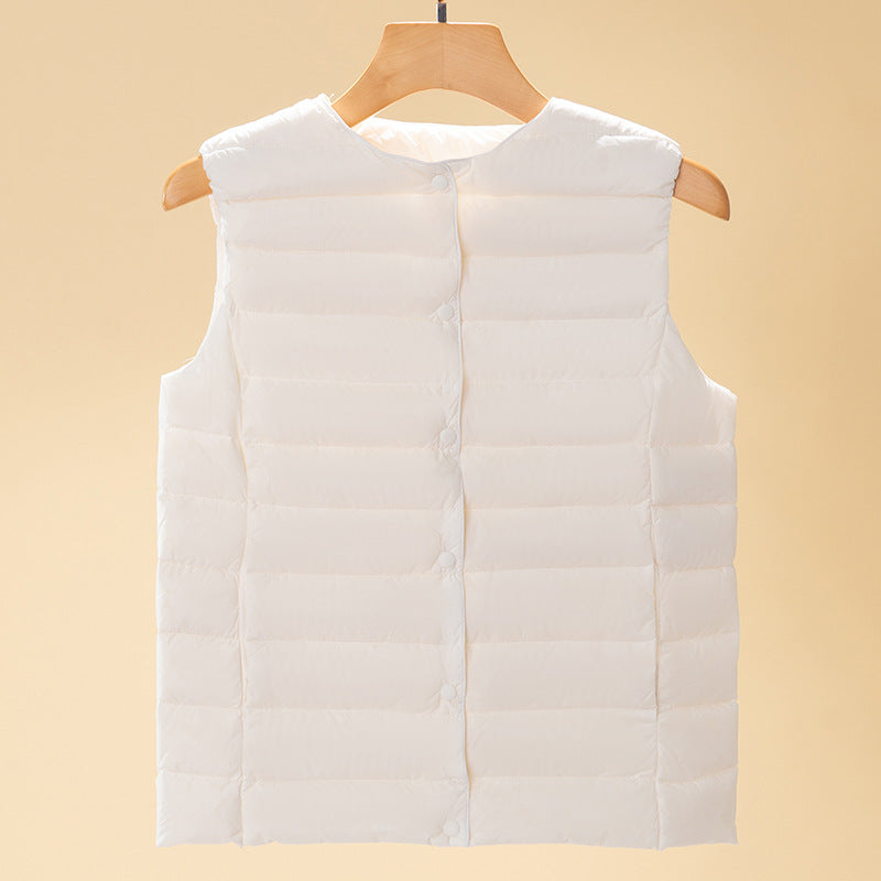 Women's sleeveless quilted thermal vest with round neck and snap button placket Amarae