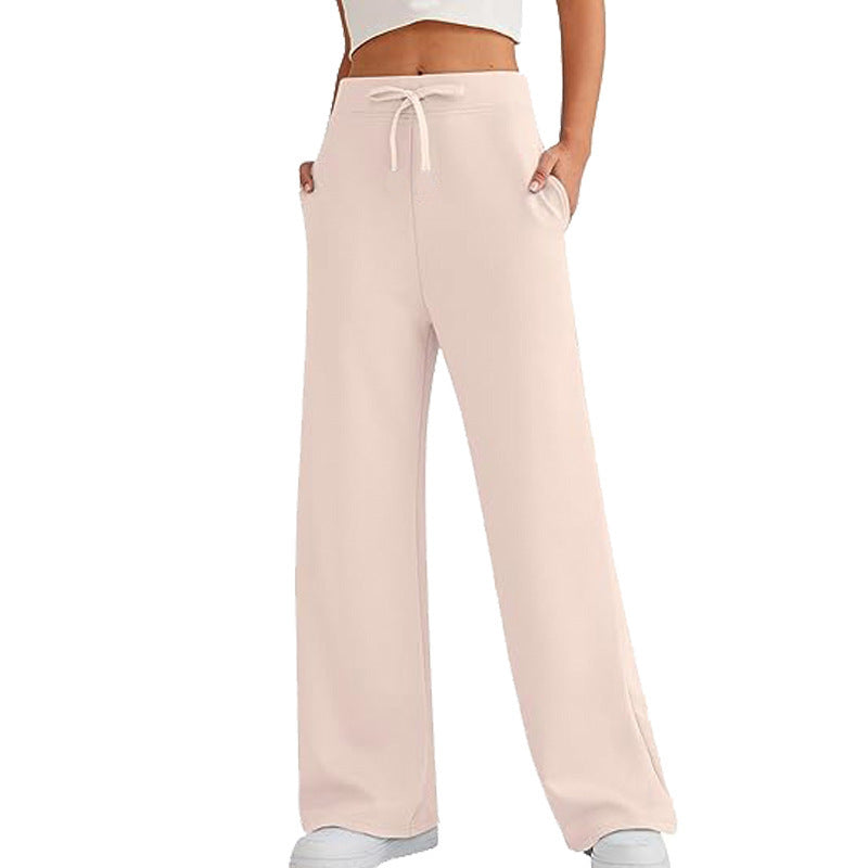 Loose women's leisure pants with elastic waist and practical pockets Lune London