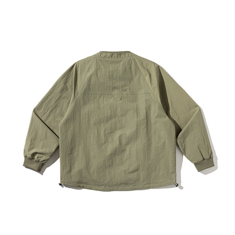 Unisex Lightweight Boxy Field Jacket without Collar with Raglan Sleeves, Patch Flap Pockets and Drawstring Amarae