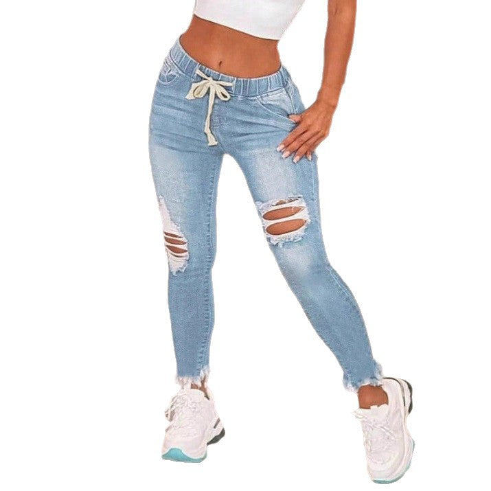 Women High-Waisted Slim Jogger Jeans with Destroyed Inserts and Drawstring Amarae
