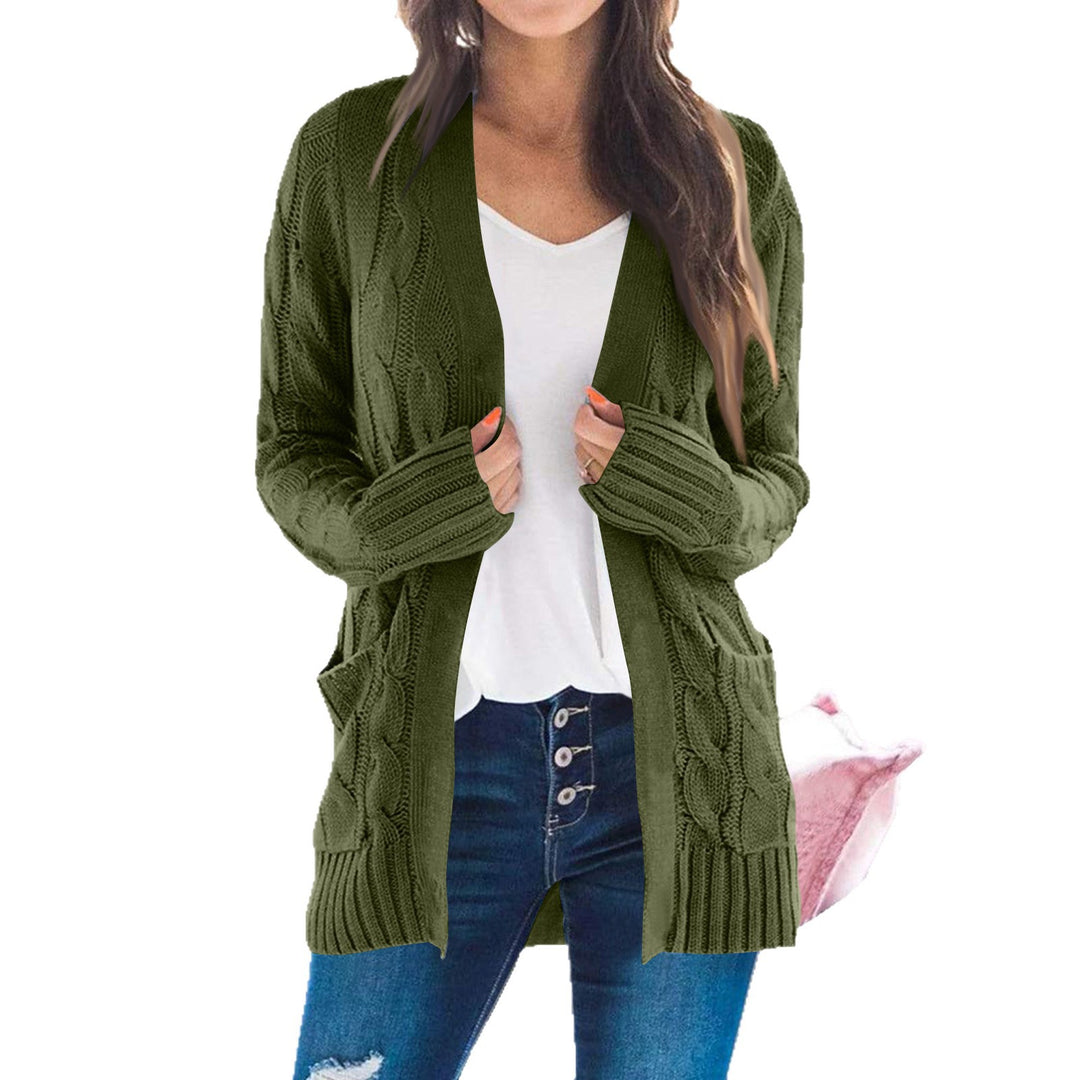Thick knit jacket for women with modern cable patterns and practical pockets Lune London