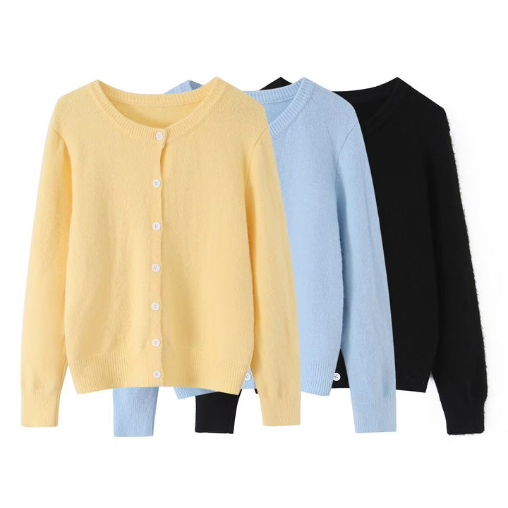 Women's lightweight fine knit cardigan with round neck, ribbed cuffs, and pearl buttons Amarae