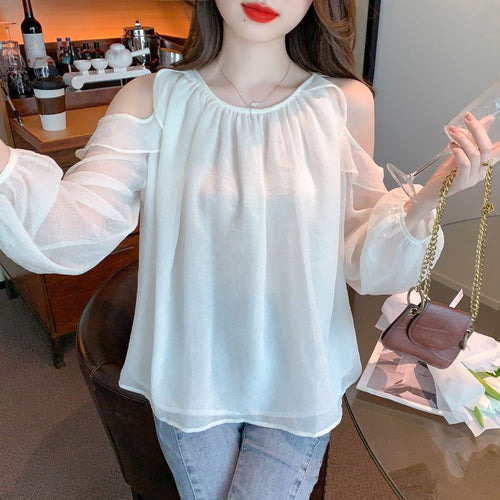 Blouse femme avec design off-shoulder et détails volants Chic & Stil