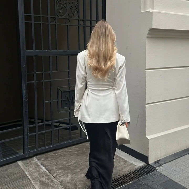 Women's tailored blazer with deep V-neck, zipper front and drawstring detail Amarae