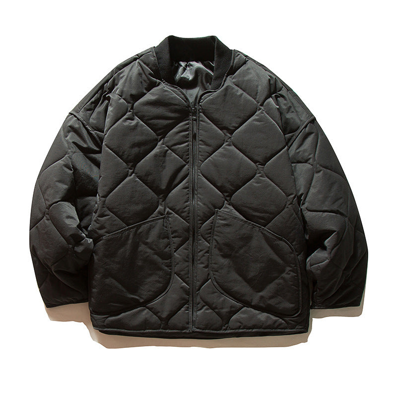 Unisex Lightweight Boxy Puffer Jacket with distinctive diamond quilting, front round pockets, and ribbed collar Amarae