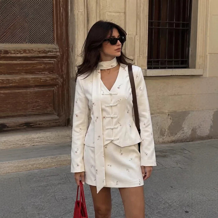 Women Tailored Blazer with Mandarin Collar, Decorative Knot Closures and Matching Mini Skirt Amarae