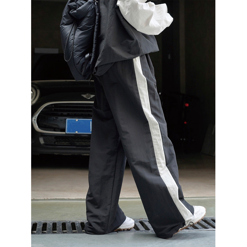 Women Wide High-Waist Track Pants in Palazzo Cut with Contrasting Side Stripe Amarae