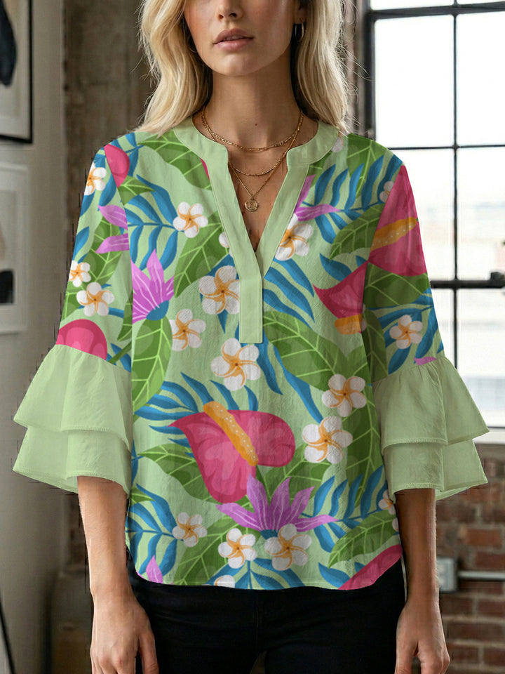 Ladies elegant top with voluminous ruffle hems and floral design Lune London