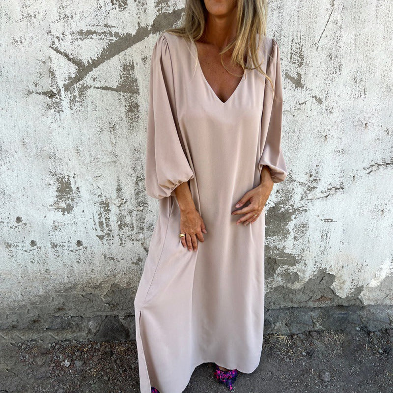 Maxi dress for women with deep V-neckline and practical side pockets Lune London