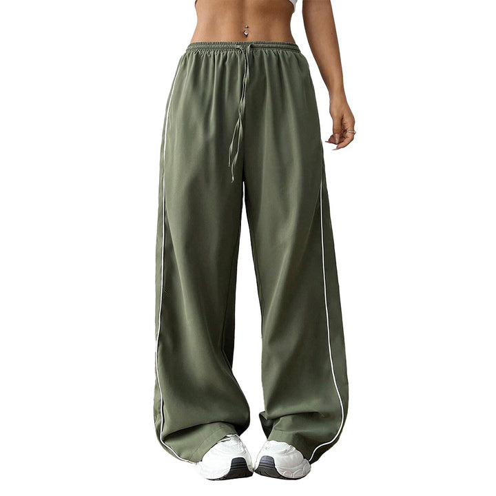 Pantalons de sport amples pour femmes avec taille élastique et bandes latérales élégantes Chic & Stil