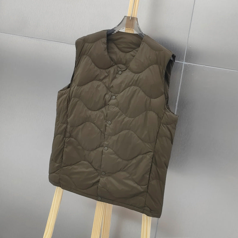Women’s sleeveless thermal quilted vest with wave-shaped quilting and snap button closure Amarae