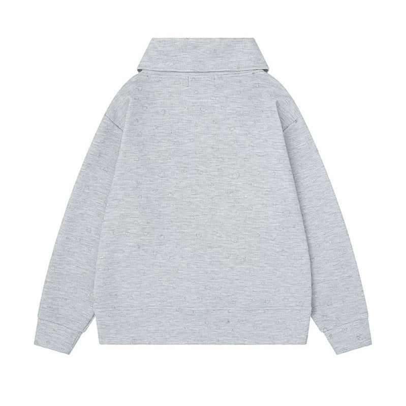 Women’s oversized sweatshirt with asymmetrical stand-up collar, kangaroo pocket and musical heart embroidery Amarae