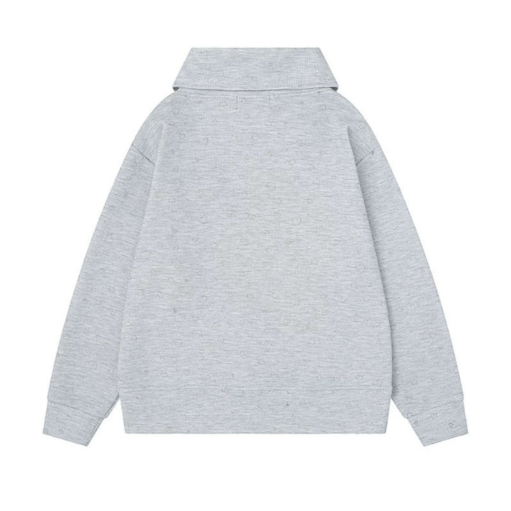 Women’s oversized sweatshirt with asymmetrical stand-up collar, kangaroo pocket and musical heart embroidery Amarae