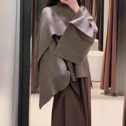 Ladies comfortable knitted poncho with refined drapes Lune London