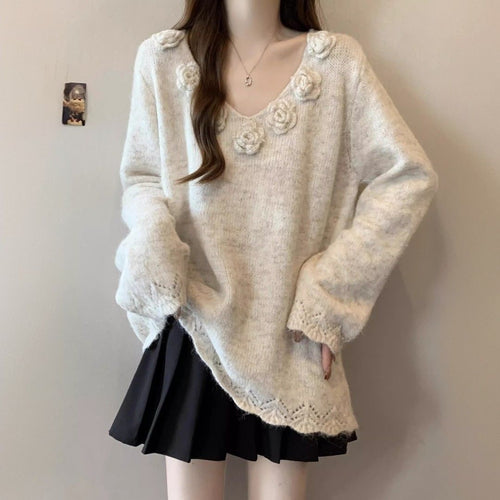 Pull en maille large pour femme avec applications florales Chic & Stil
