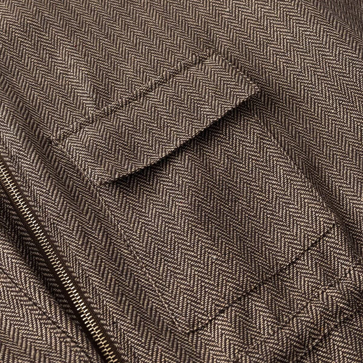 Women's short-sleeved tailored transition jacket with zipper, drawstring, and patch chest pockets Amarae