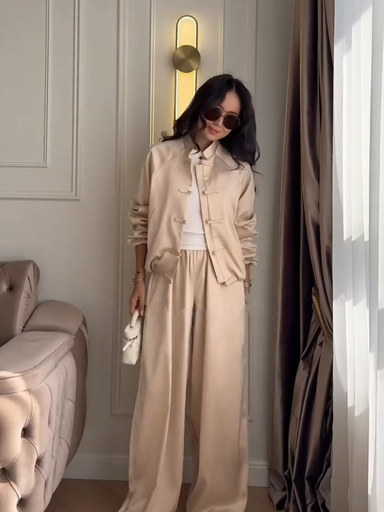 Women’s satin two-piece with traditional toggle closures and wide pants skirt Amarae