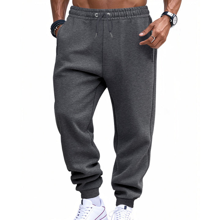 Comfortable sports pants for men with elastic waistband and practical side pockets Lune London