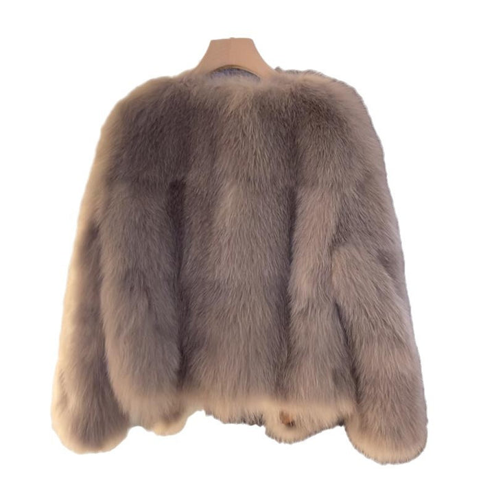 Veste en fausse fourrure confortable pour femmes avec une coupe élégante et des boucles décoratives Chic & Stil
