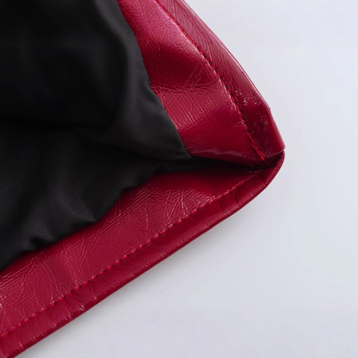 Veste pour femmes en simili cuir avec une finition brillante et poches pratiques Chic & Stil