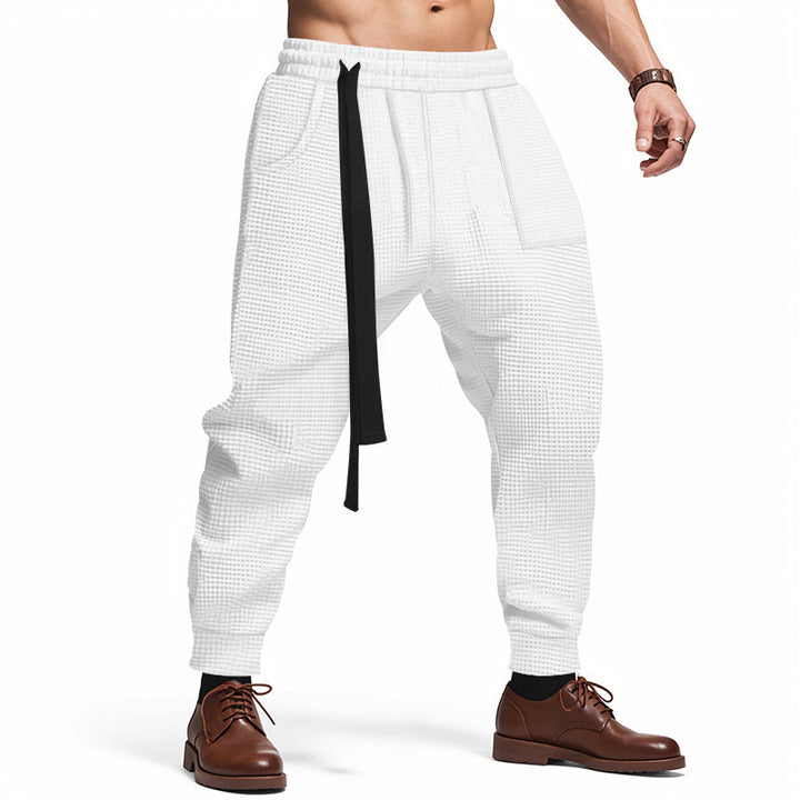Men's casual fabric trousers with functional pockets and practical drawstring Chic and style