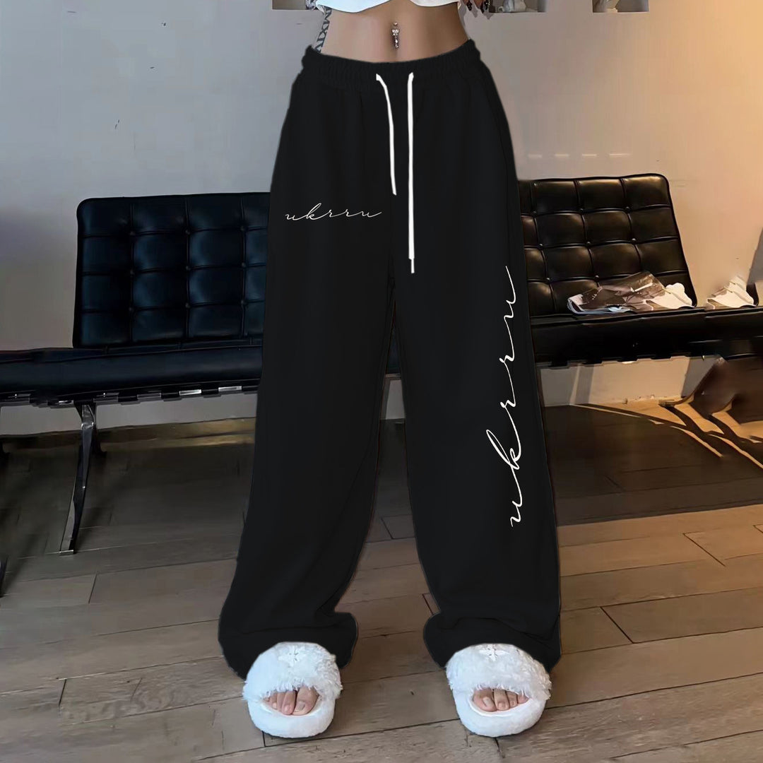 Women comfortable leisure trousers with elastic waistband and side print Chic & Stil