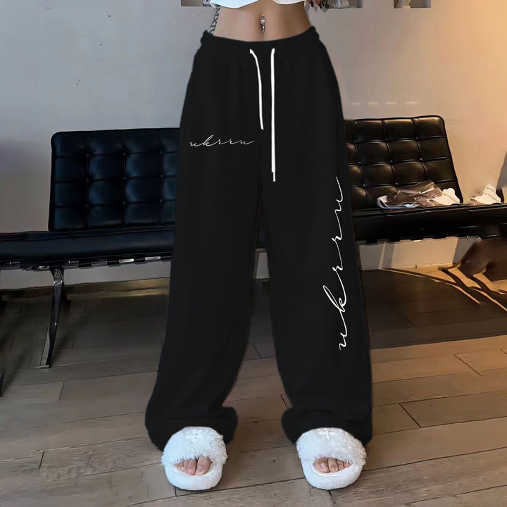 Women comfortable leisure trousers with elastic waistband and side print Chic & Stil