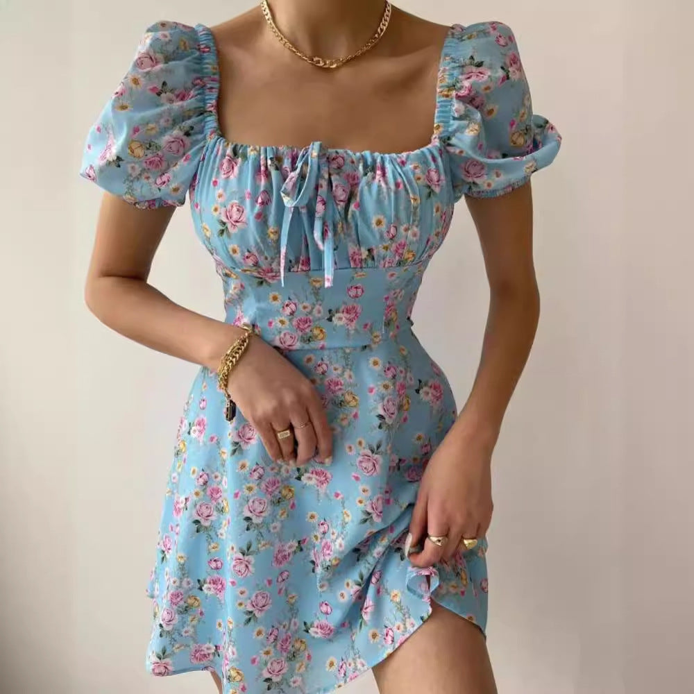 Ladies mini dress with voluminous puff sleeves and floral pattern Lune London