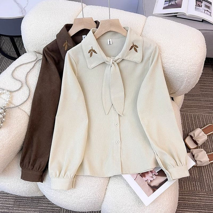 Blouse élégante pour femmes avec col en nœud Chic & Stil