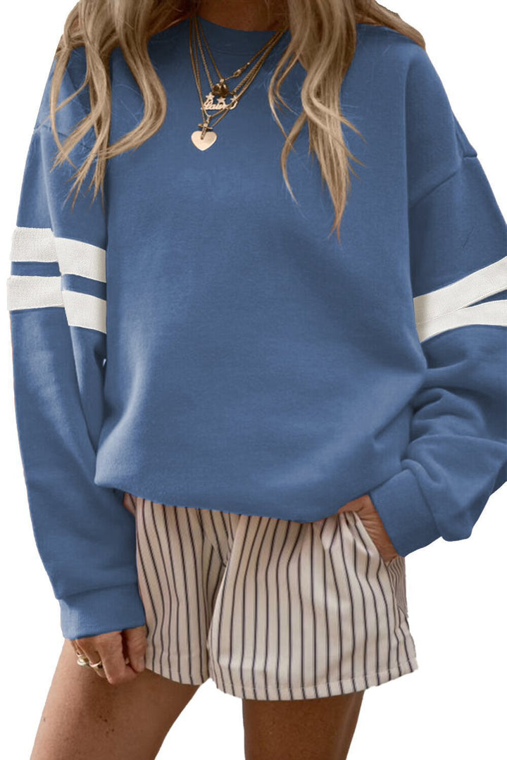 Oversized sporty sweater for women with striped accents and a casual fit Lune London