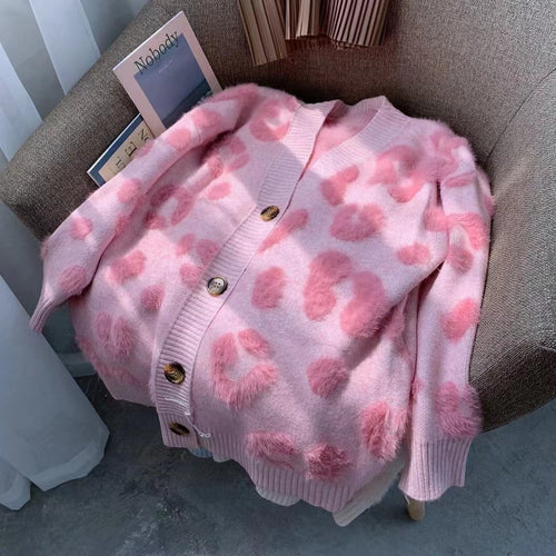 Sweater vest for women in cozy knit with heart shape design and button detail Amarae