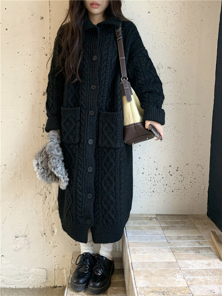Thick knit button coat for ladies with an elegant cable pattern and practical pockets Lune London