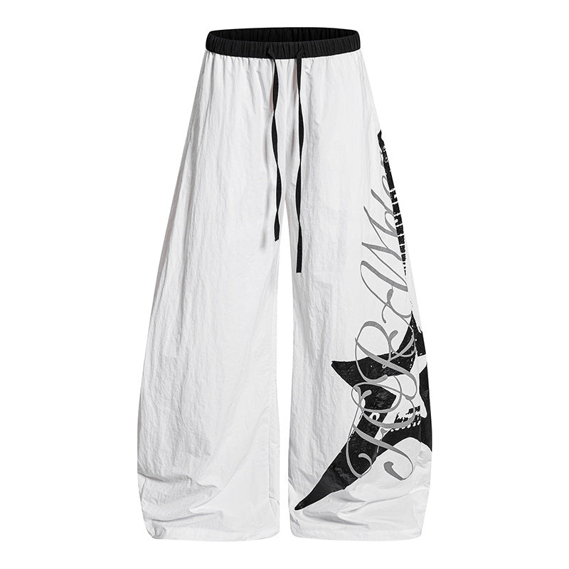 Women's Wide Palazzo Trousers with Drawstring Waist and Large Statement Print Amarae