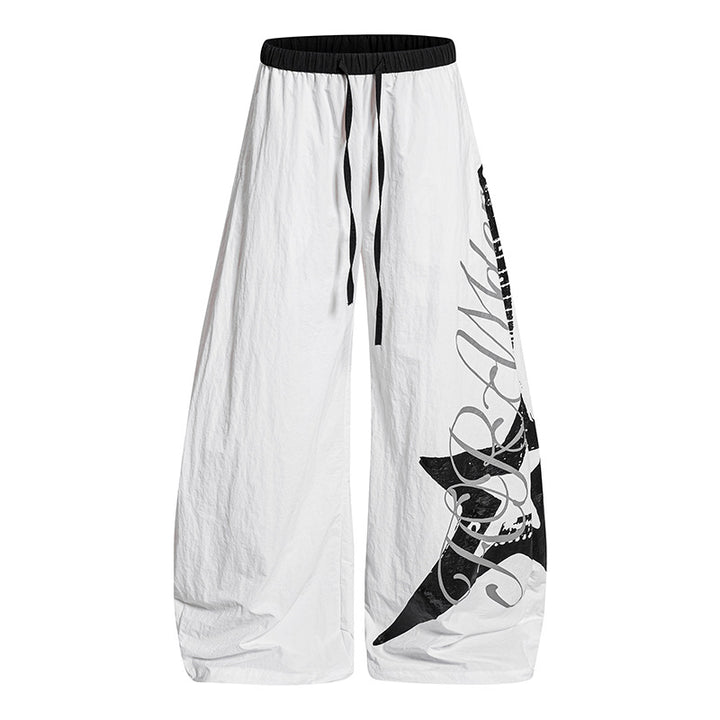 Women's Wide Palazzo Trousers with Drawstring Waist and Large Statement Print Amarae